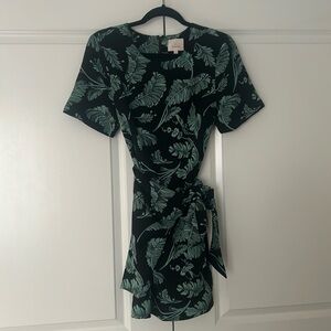 Cinq A Sept black mini dress with green leaf detail. Size 8.
